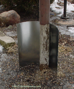 Valley tin or furnace duct squirrel or raccoon bird feeder shield